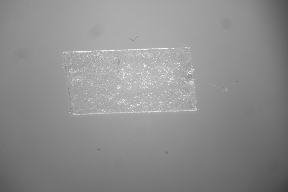 Visible light photograph of tape on glass